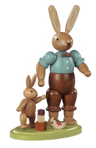 Easter bunny, male, with playing child