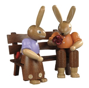 Easter bunny, couple, on garden bench